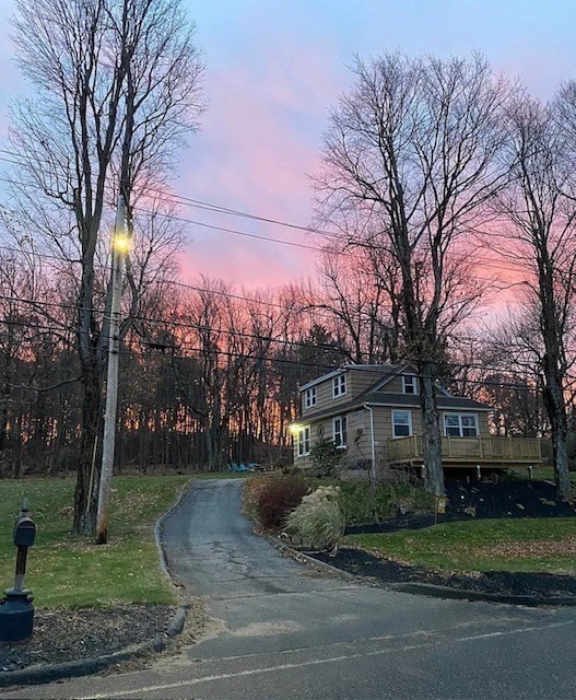 26 Glenwood Road, Unit 26 Rutland, MA 01543 - Photo 2 of 16 a view of a house with a yard