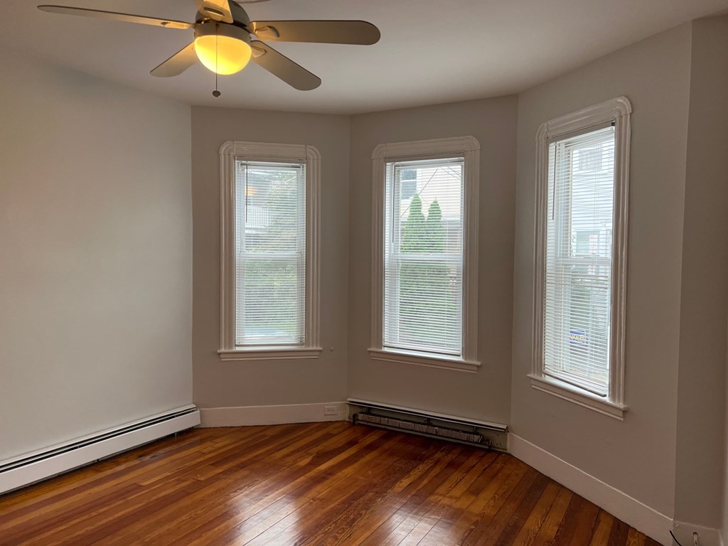 3 Carson Street, Unit 1 Boston, MA 02125 - Photo 12 of 14 an empty room with window