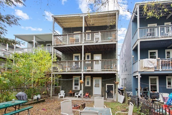 3 Carson Street, Unit 1 Boston, MA 02125 - Photo 14 of 14 a front view of a building with balcony