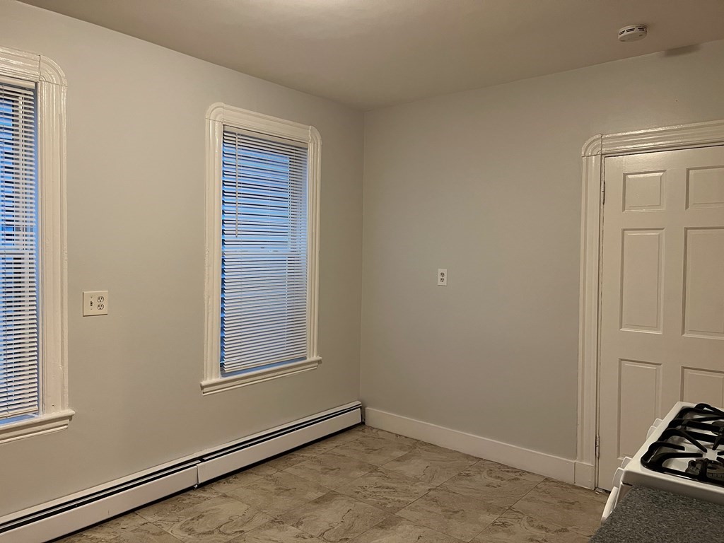 3 Carson Street, Unit 1 Boston, MA 02125 - Photo 4 of 14 an empty room with windows