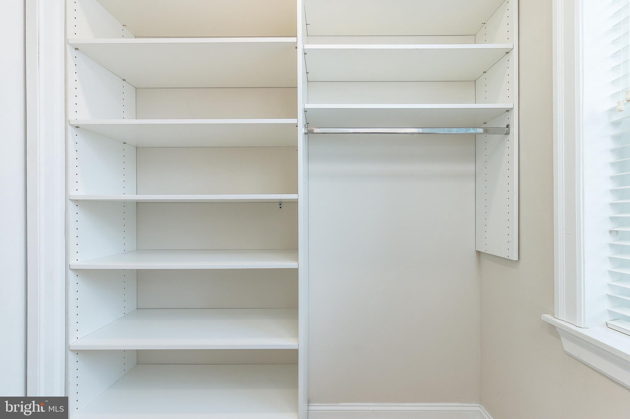 908 Spruce Street, Unit 10 Philadelphia, PA 19107 - Photo 13 of 41 a view of walk in closet with empty racks
