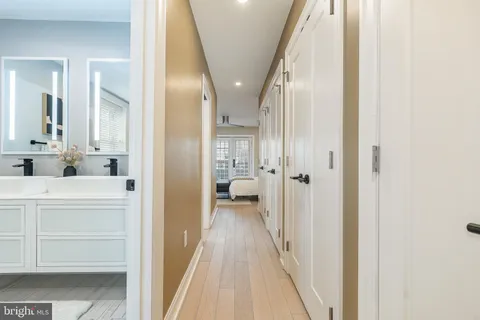 a en suite bathroom with a sink and a mirror