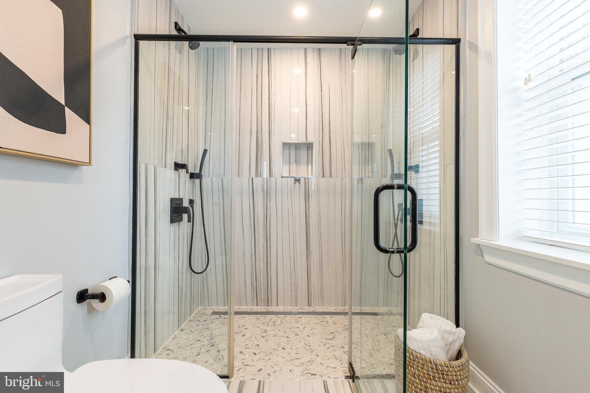 908 Spruce Street, Unit 10 Philadelphia, PA 19107 - Photo 25 of 41 a bathroom with a shower and a sink