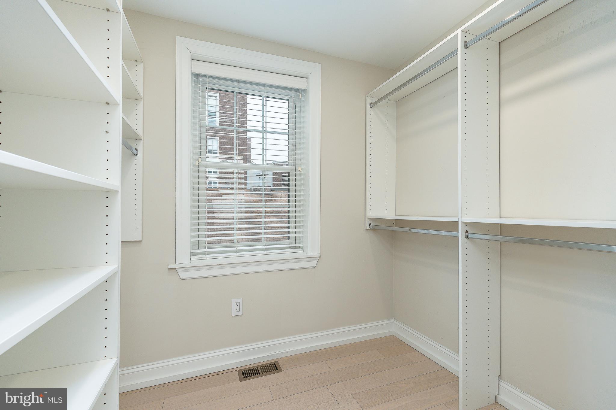 908 Spruce Street, Unit 10 Philadelphia, PA 19107 - Photo 26 of 41 a view of an empty room with a window