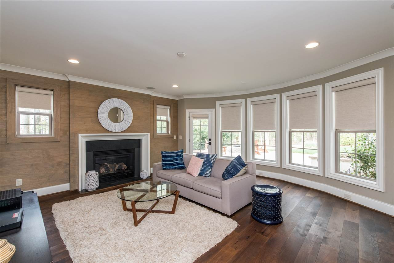 12221 Upper Creek Way Raleigh, NC 27614 - Photo 20 of 30 Man cave/basement bonus room. This basement bonus has natural light , half bathroom , and outdoor entry. Man Cave