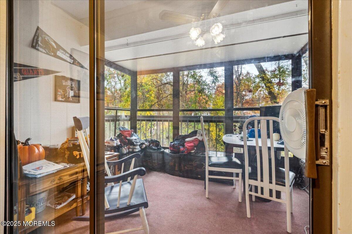 93 Arrowood Road, Unit G Manalapan, NJ 07726 - Photo 11 of 16 a view of a livingroom with furniture