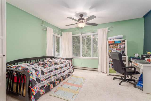 3030 North Jugtown Road Morris, IL 60450 - Photo 22 of 35 a bedroom with a bed and a chandelier