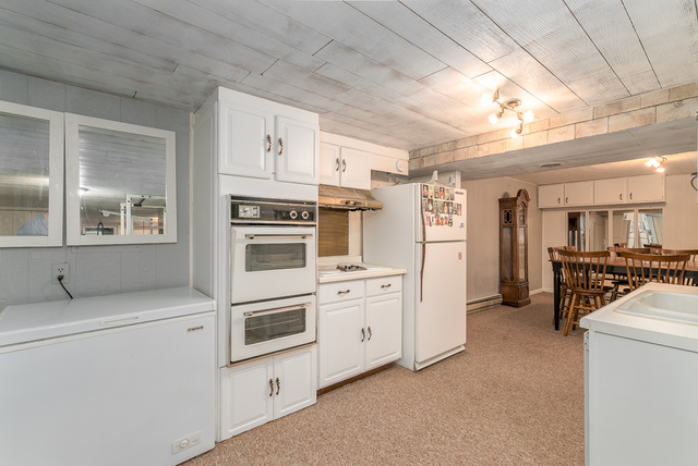 3030 North Jugtown Road Morris, IL 60450 - Photo 23 of 35 a kitchen with stainless steel appliances a refrigerator sink and cabinets