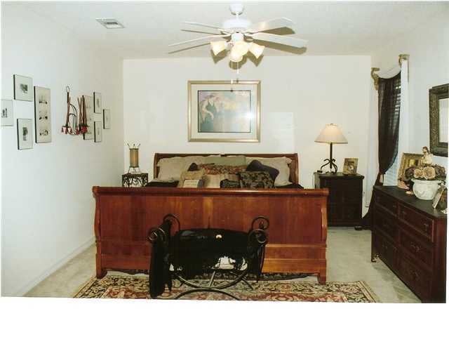 185 Beacon Way Miramar Beach, FL 32550 - Photo 8 of 14 a living room with furniture and wooden floor