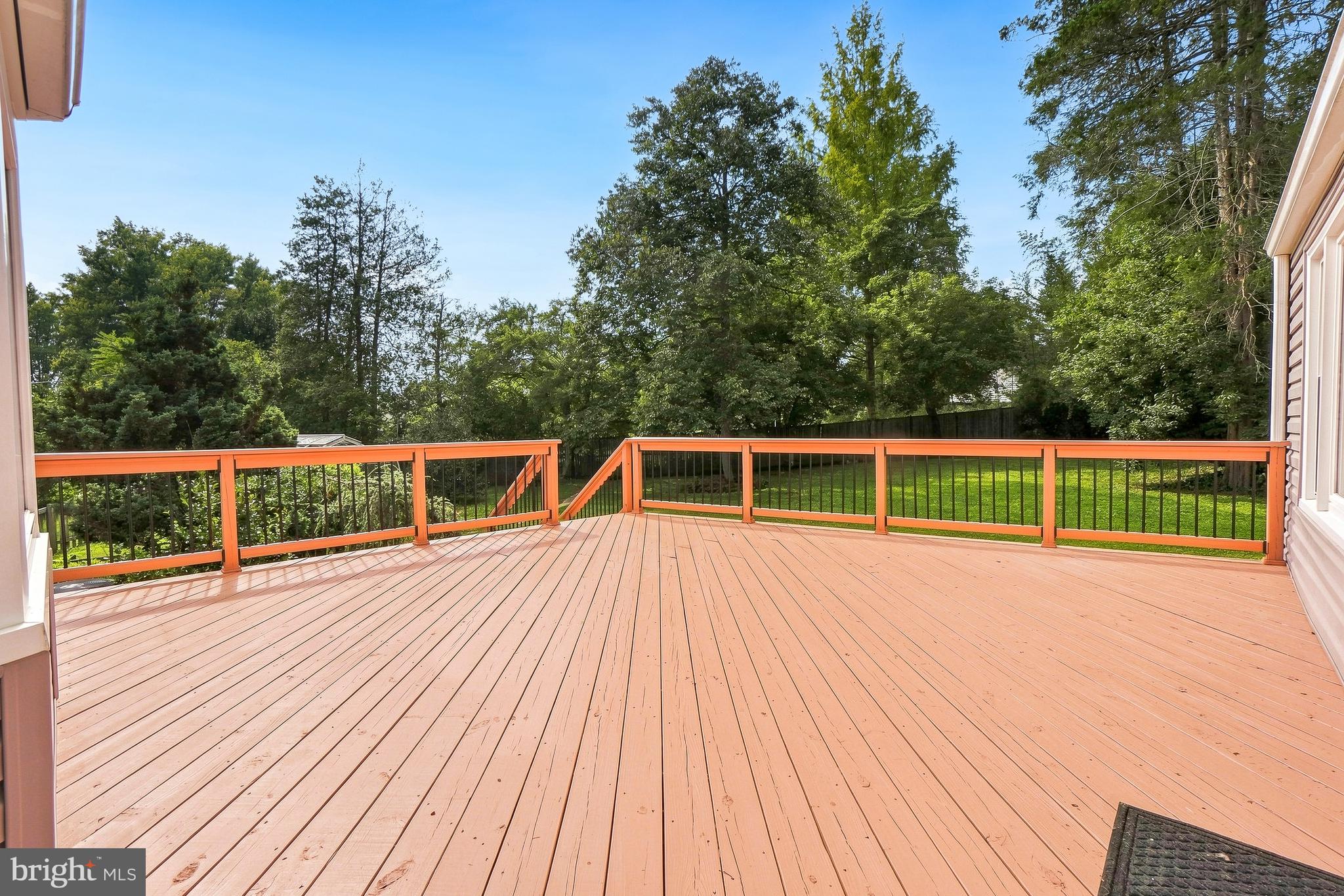 15400 Layhill Road Silver Spring, MD 20906 - Photo 39 of 45 gorgeous deck overlooking fenced backyard gardens