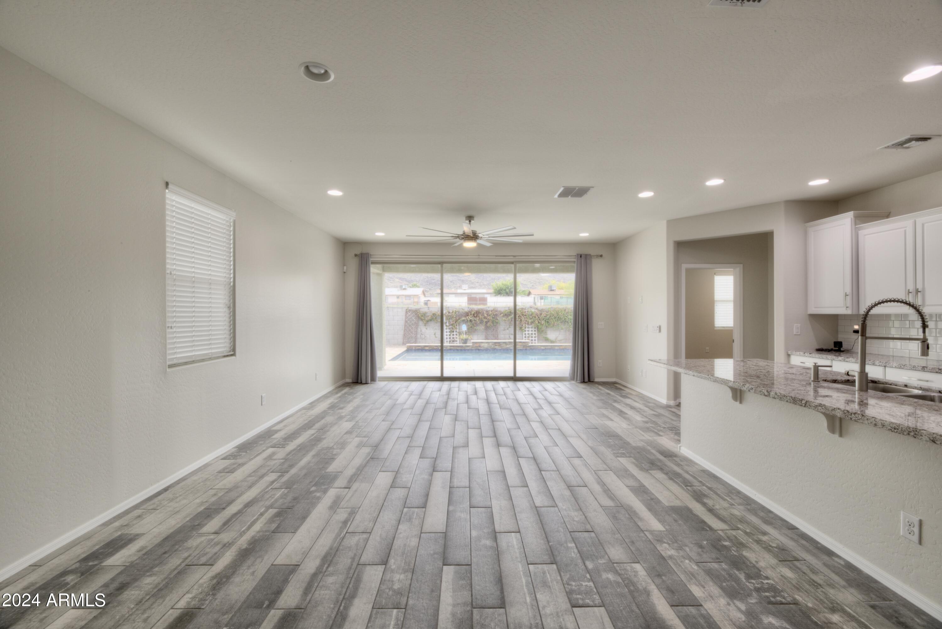 2429 East Beverly Road Phoenix, AZ 85042 - Photo 11 of 24 Beverly Great Rm with doors closed