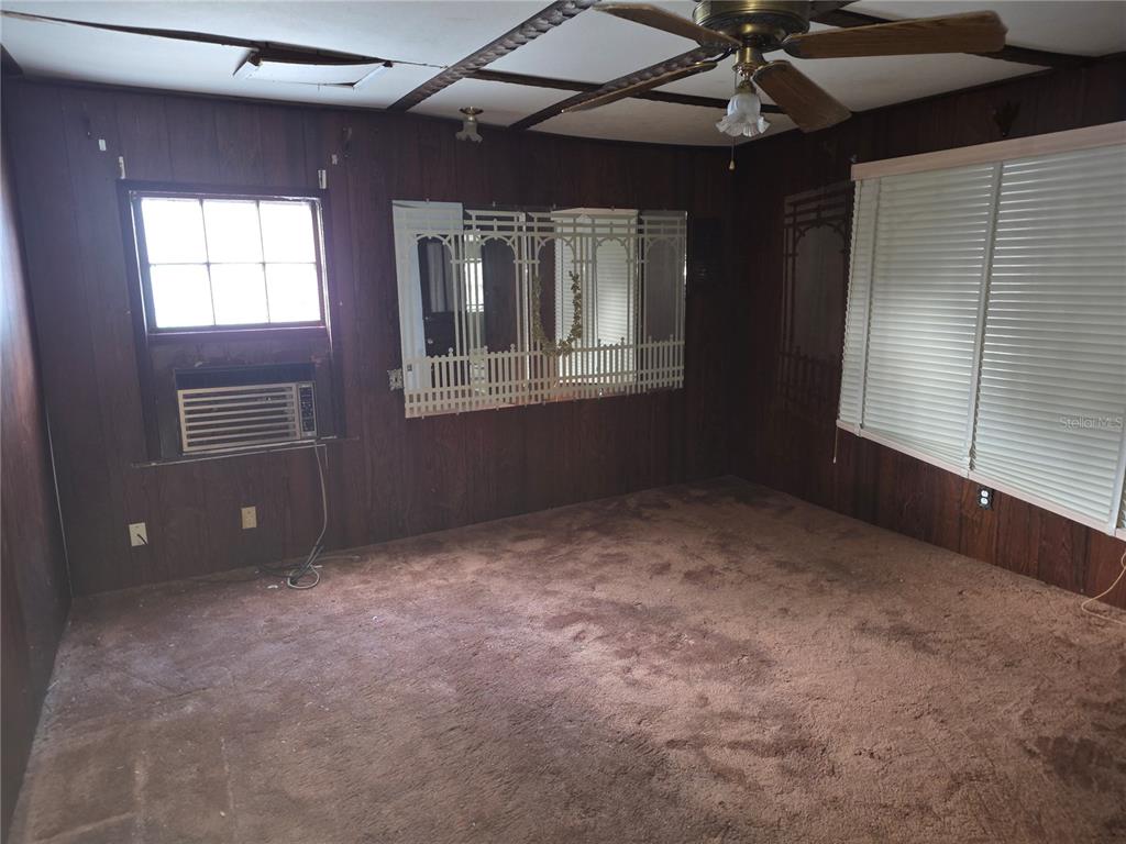 404 Northwest 7th Street Mulberry, FL 33860 - Photo 17 of 22 a view of an empty room with a window