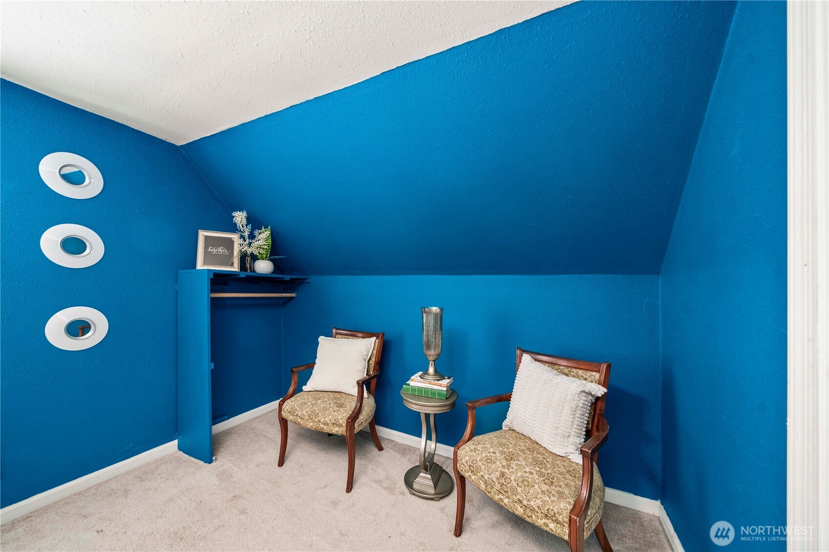10443 184th Avenue Southwest Rochester, WA 98579 - Photo 20 of 38 a blue chair sitting next to a bathroom