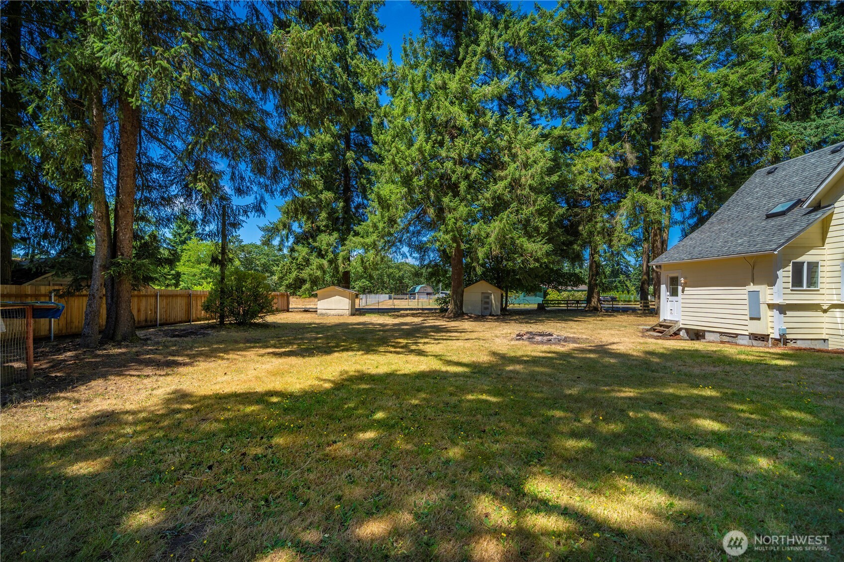 10443 184th Avenue Southwest Rochester, WA 98579 - Photo 31 of 38 a view of a house with swimming pool