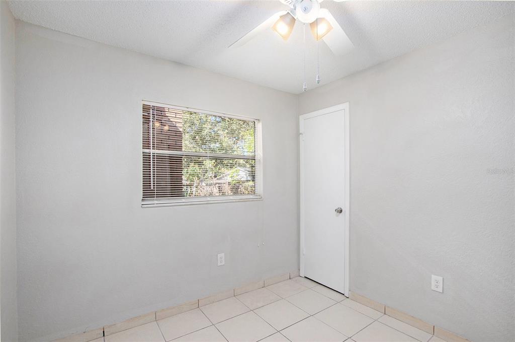 217 Faithway Drive Seffner, FL 33584 - Photo 23 of 29 an empty room with windows