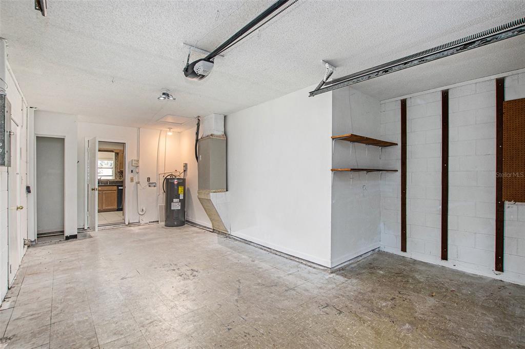 217 Faithway Drive Seffner, FL 33584 - Photo 25 of 29 an empty room with closet and a glass door