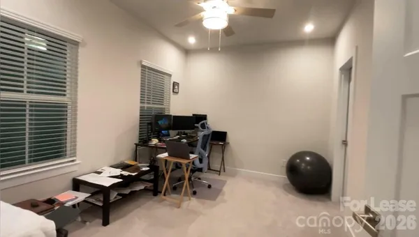 a room with furniture and a window
