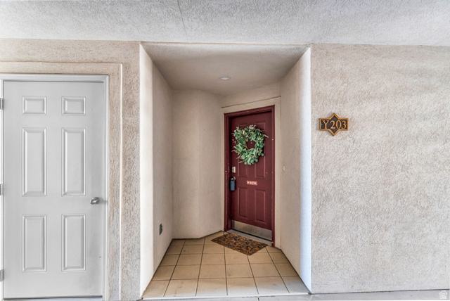 1136 West Spencer Road, Unit Y203 Pleasant Grove, UT 84062 - Photo 3 of 26 Entrance to property with stucco siding