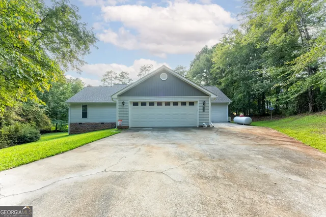 a view of a lake with a yard