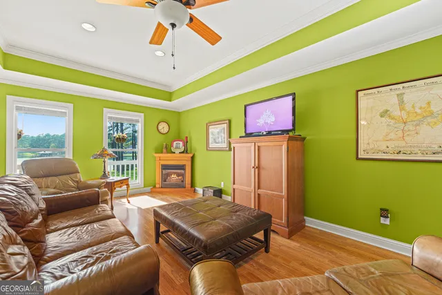 a view of walk in closet with clothes