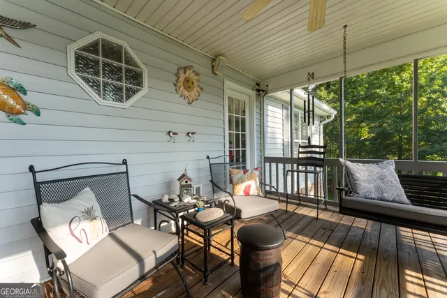 a view of balcony with furniture