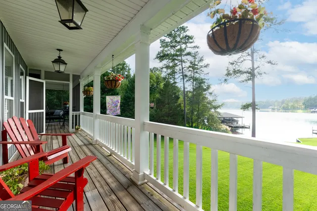 a view of balcony with furniture