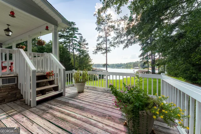 a view of a swimming pool with a yard