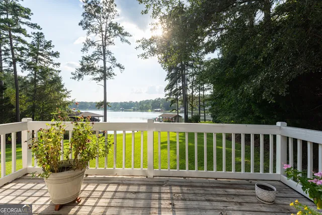 a view of a swimming pool with lounge chairs