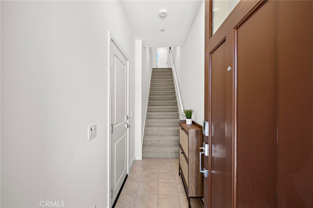 61 Wheelbarrow Road Rancho Mission Viejo, CA 92694 - Photo 26 of 74 a view of hallway with stairs