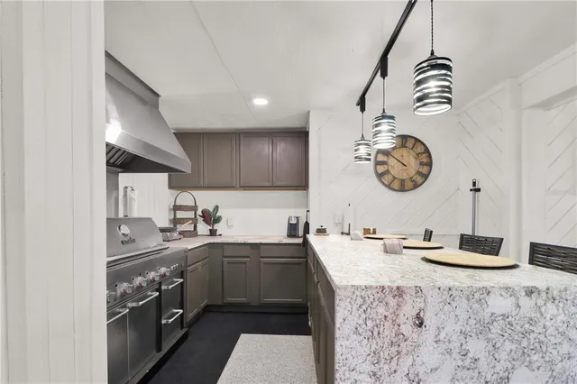 a bedroom with a bed and flat screen tv