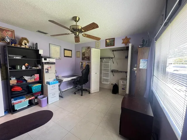 a room with furniture and a window