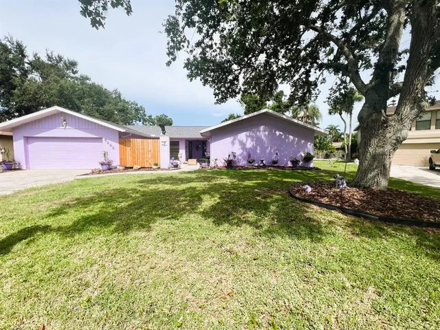 a house view with a garden space