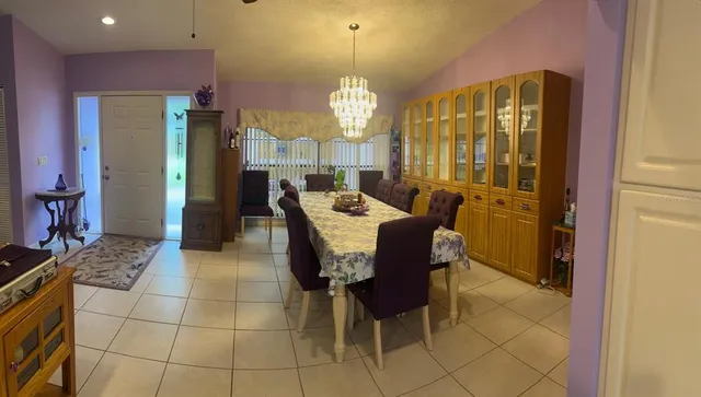 a room with lots of furniture and windows