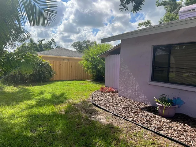 a view of a garage with a fountain