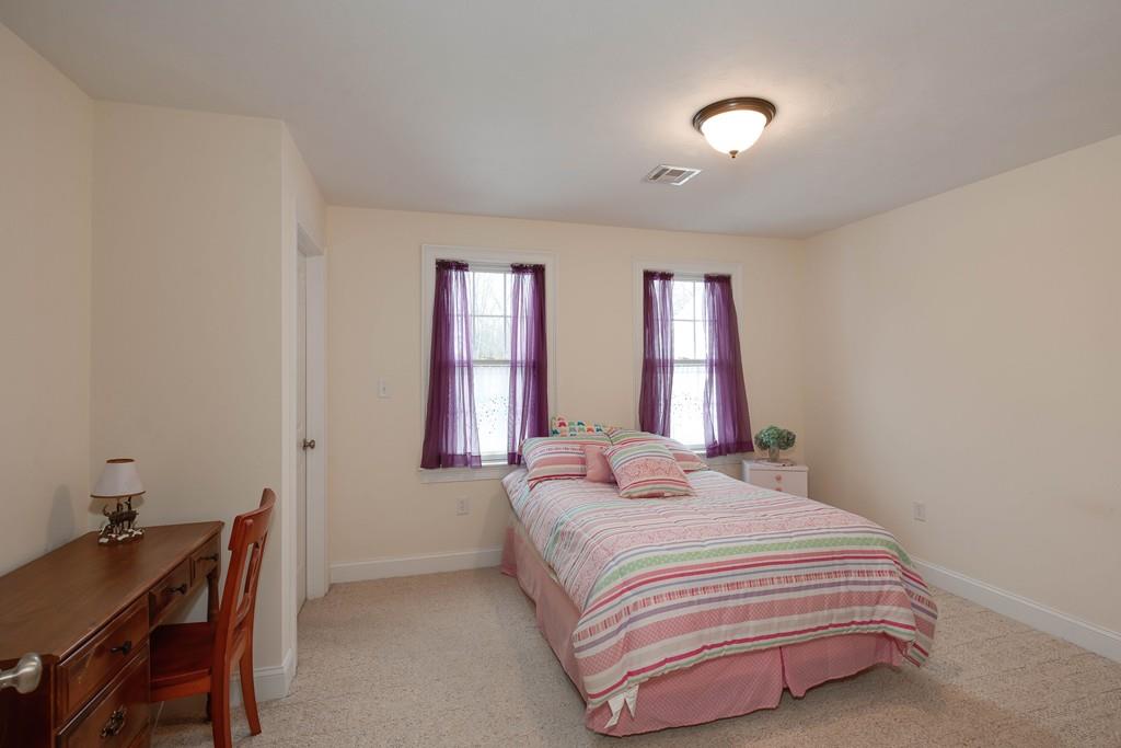 154 Brooks Station Road Princeton, MA 01541 - Photo 25 of 40 a bedroom with a bed and a window