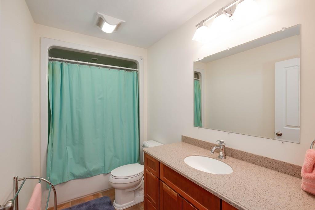 154 Brooks Station Road Princeton, MA 01541 - Photo 26 of 40 a bathroom with a granite countertop sink toilet and shower