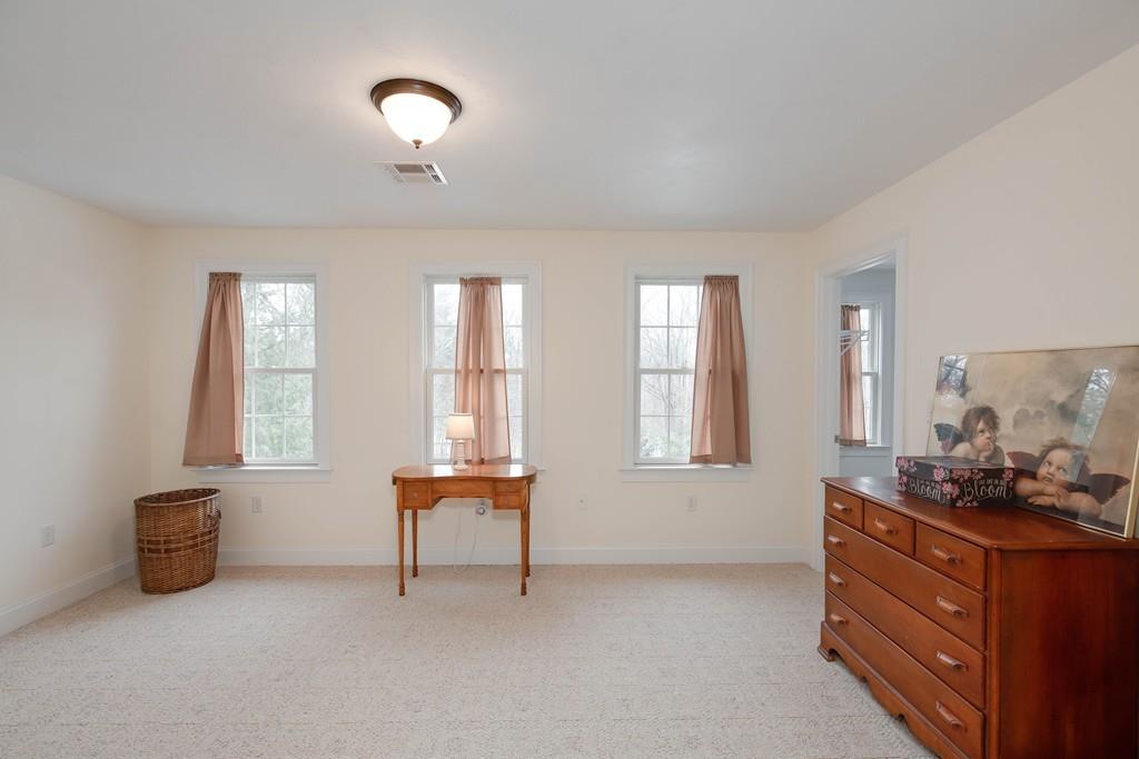 154 Brooks Station Road Princeton, MA 01541 - Photo 29 of 40 a room with furniture and window