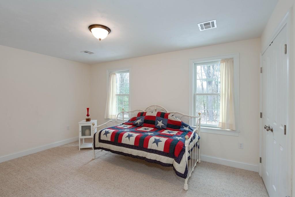 154 Brooks Station Road Princeton, MA 01541 - Photo 31 of 40 a bedroom with a bed and window