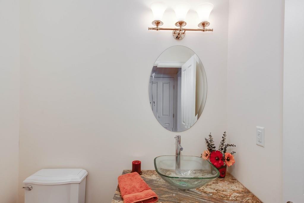 154 Brooks Station Road Princeton, MA 01541 - Photo 7 of 40 a bathroom with a toilet sink and mirror