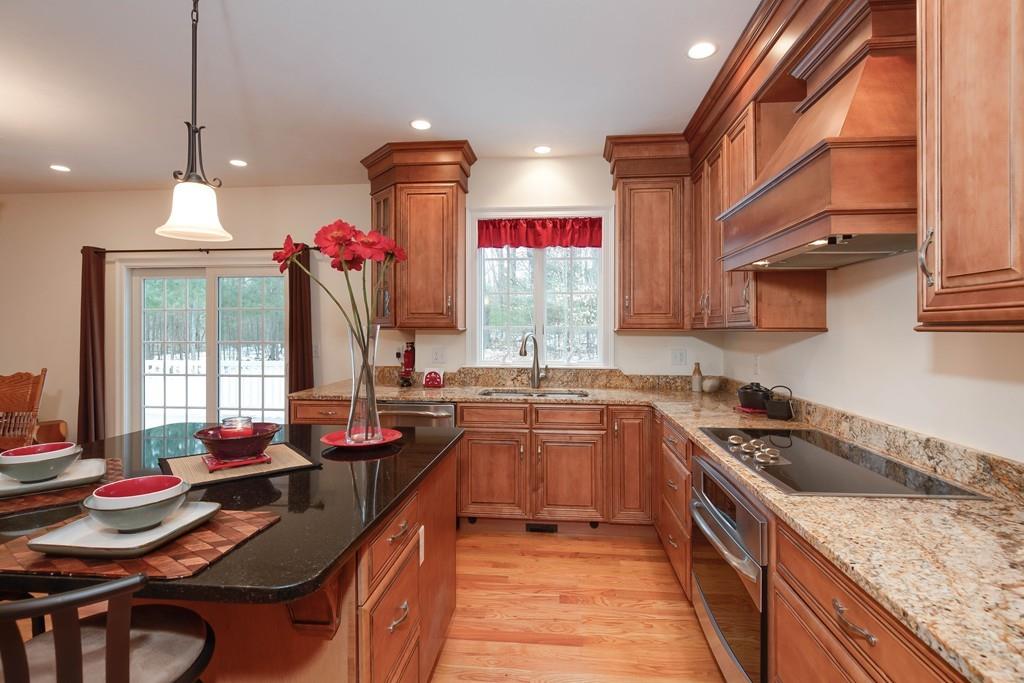 154 Brooks Station Road Princeton, MA 01541 - Photo 10 of 40 a kitchen with a sink stove and cabinets