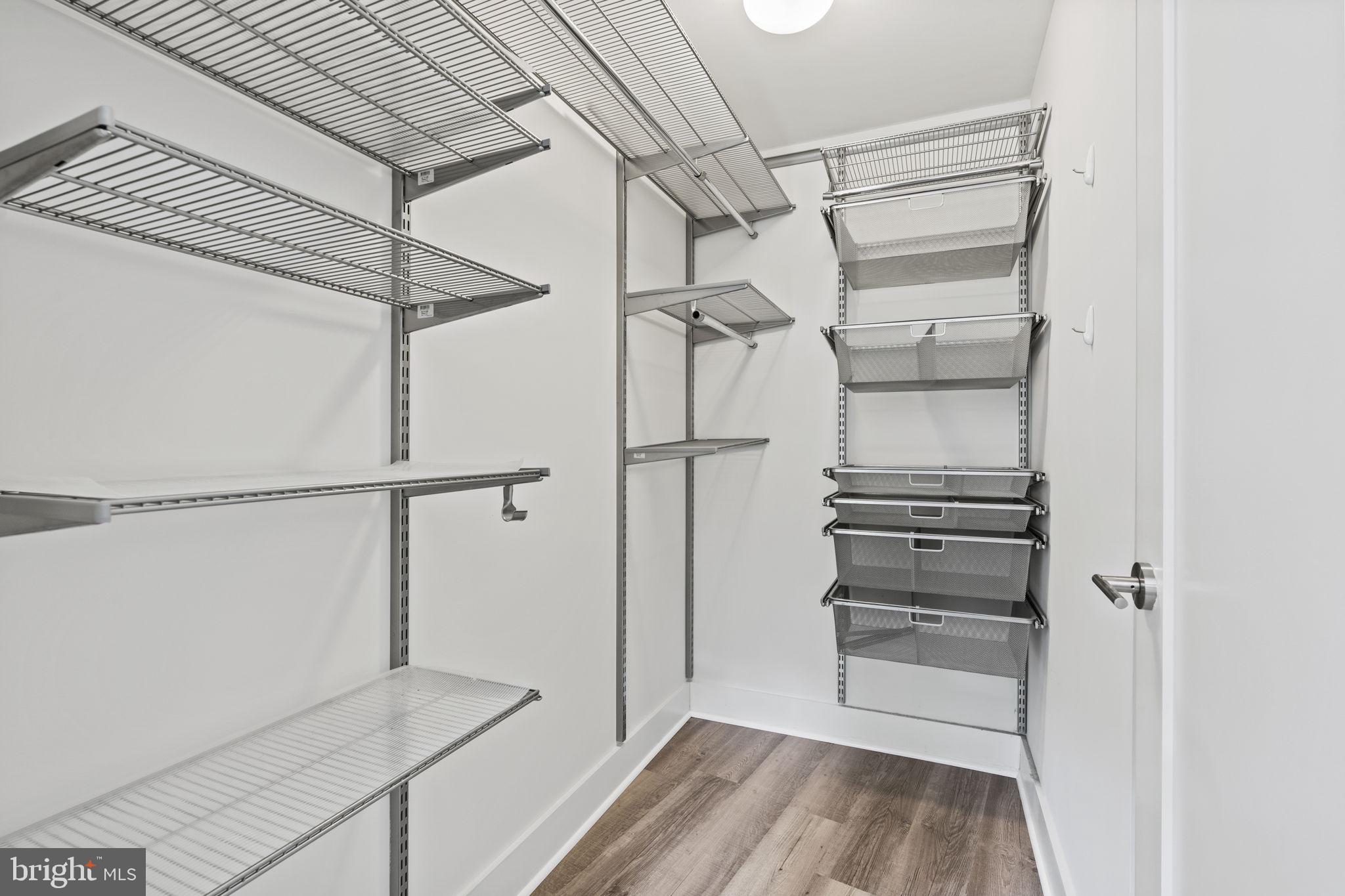 2337 Champlain Street Northwest, Unit 105 Washington, DC 20009 - Photo 22 of 26 Large walk-in closet with custom organizers