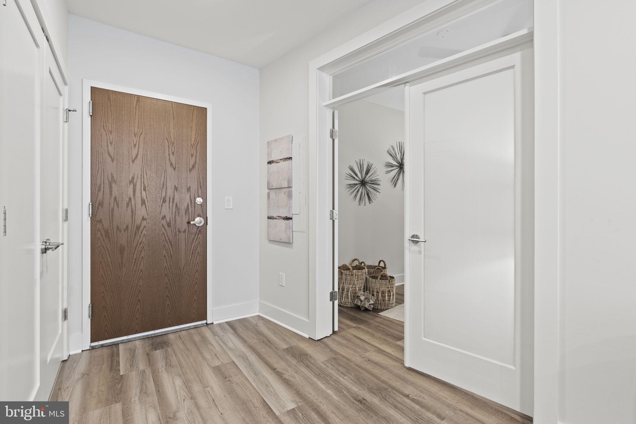 2337 Champlain Street Northwest, Unit 105 Washington, DC 20009 - Photo 7 of 26 Front door and door to the den