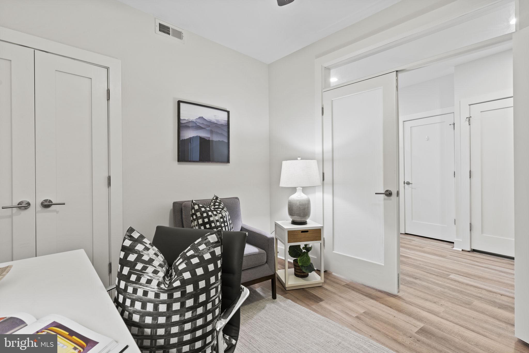 2337 Champlain Street Northwest, Unit 105 Washington, DC 20009 - Photo 8 of 26 Den with ample space for sitting, working, etc