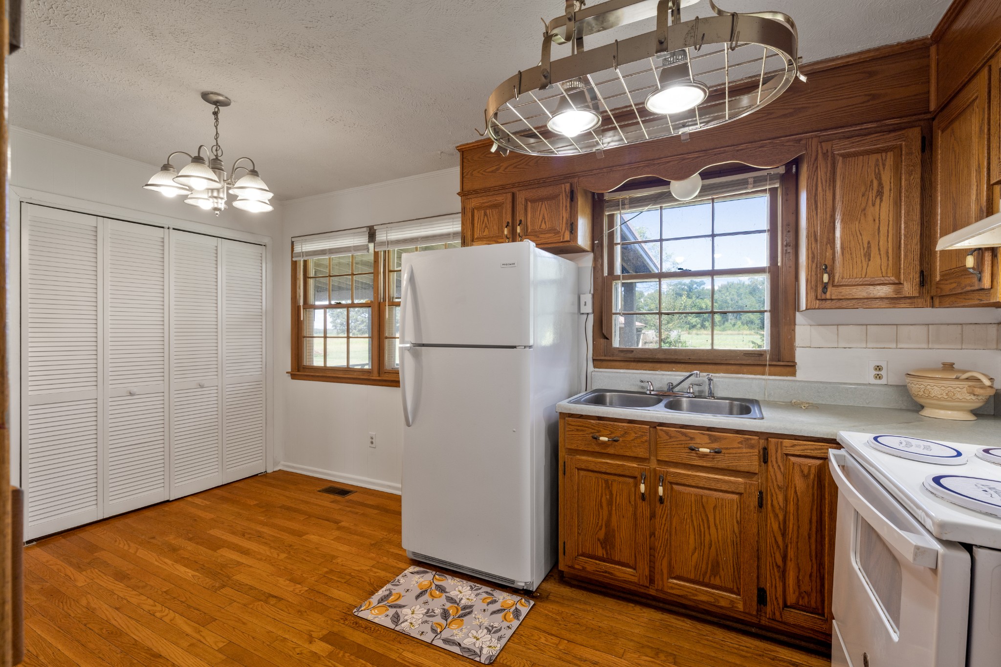 406 Asia Road Winchester, TN 37398 - Photo 16 of 30 a kitchen with a sink stove and microwave