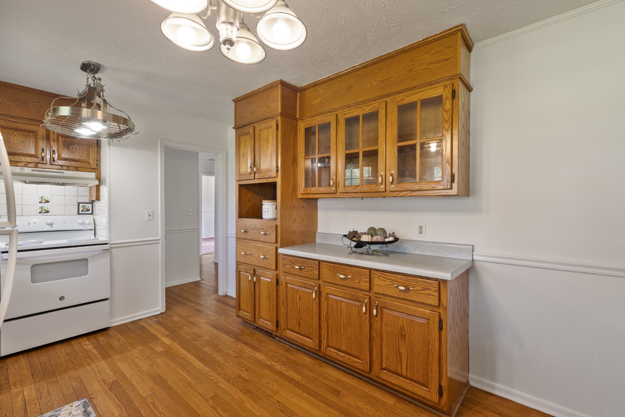 406 Asia Road Winchester, TN 37398 - Photo 17 of 30 a kitchen with stainless steel appliances granite countertop a stove and a sink
