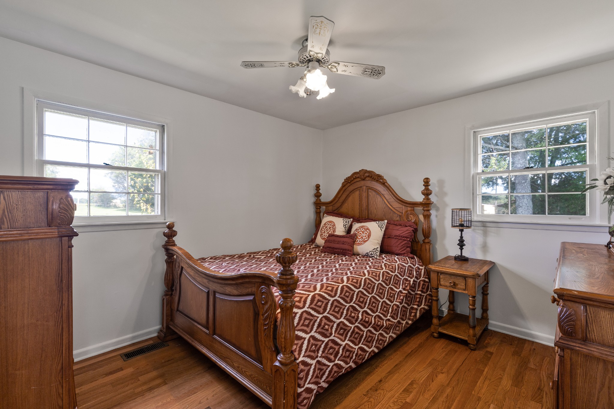 406 Asia Road Winchester, TN 37398 - Photo 20 of 30 a bedroom with a bed and wooden floor