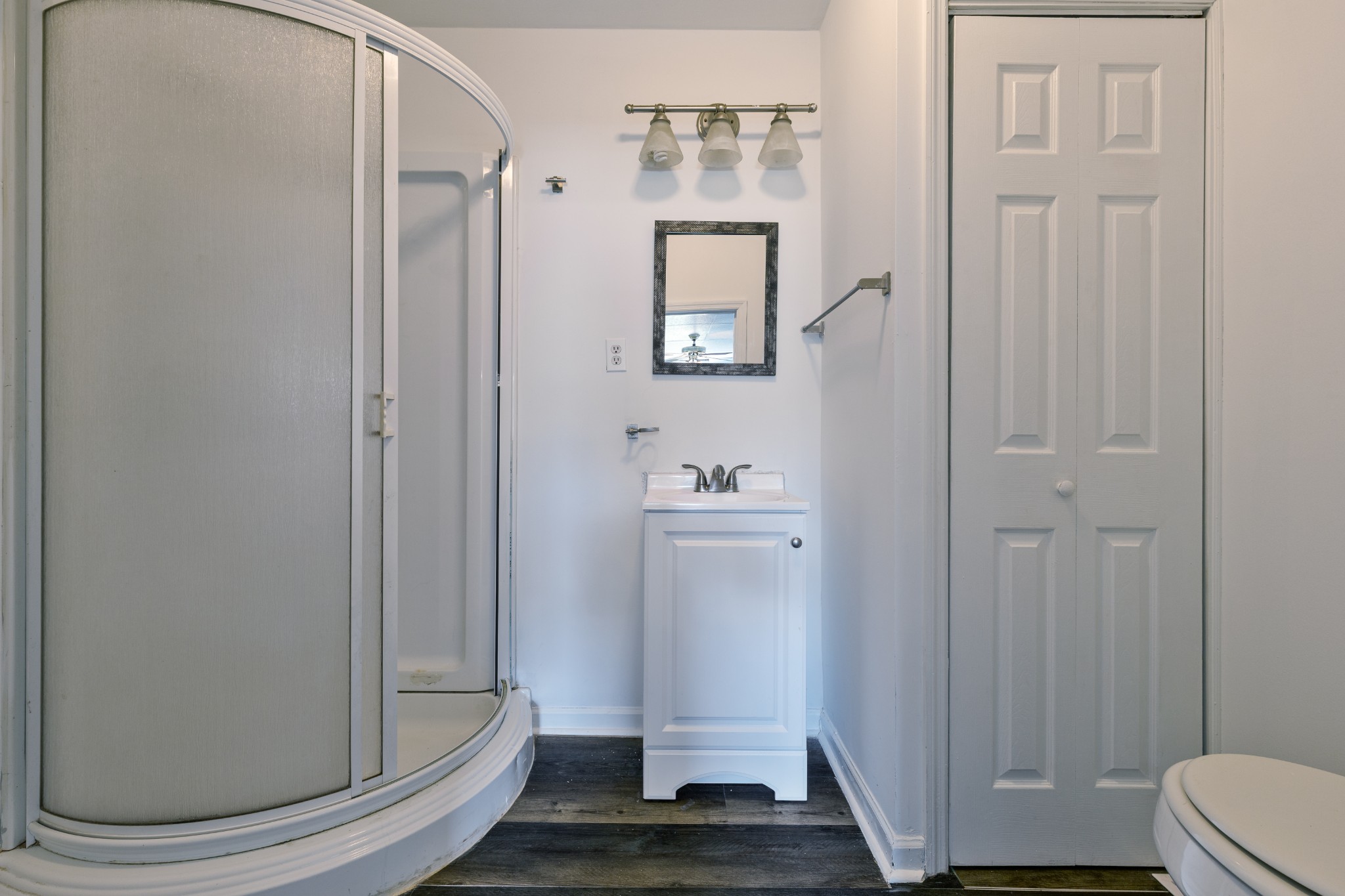 406 Asia Road Winchester, TN 37398 - Photo 25 of 30 a bathroom with sink shower and toilet