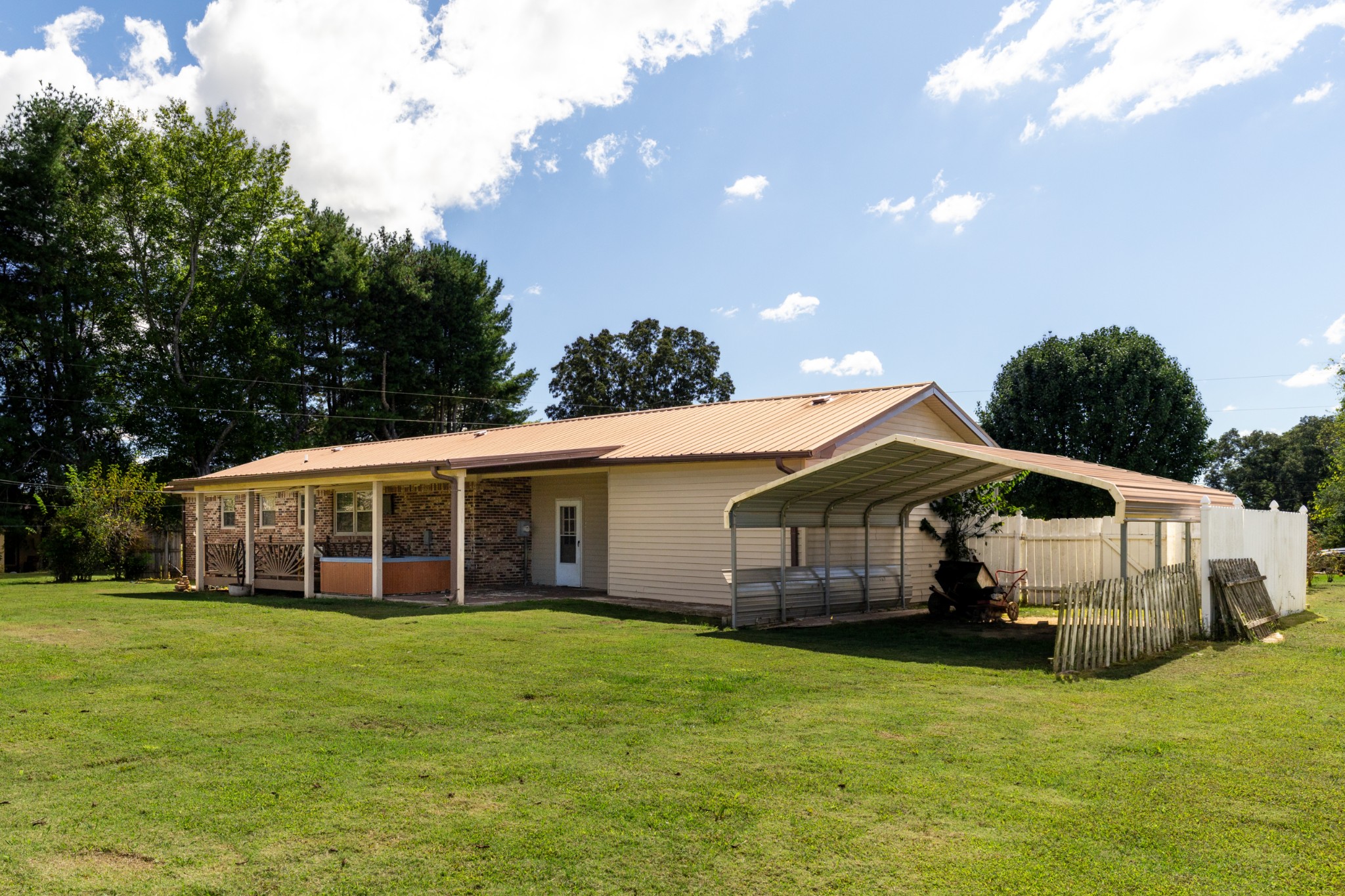 406 Asia Road Winchester, TN 37398 - Photo 4 of 30 a view of a house with a garden and deck