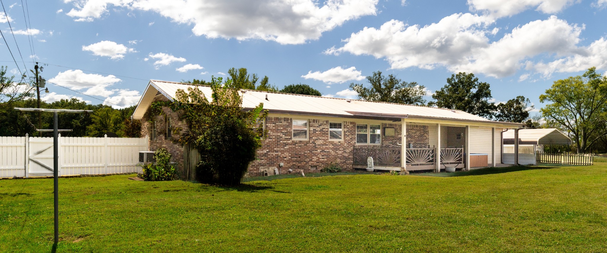 406 Asia Road Winchester, TN 37398 - Photo 6 of 30 a view of a house with backyard and porch