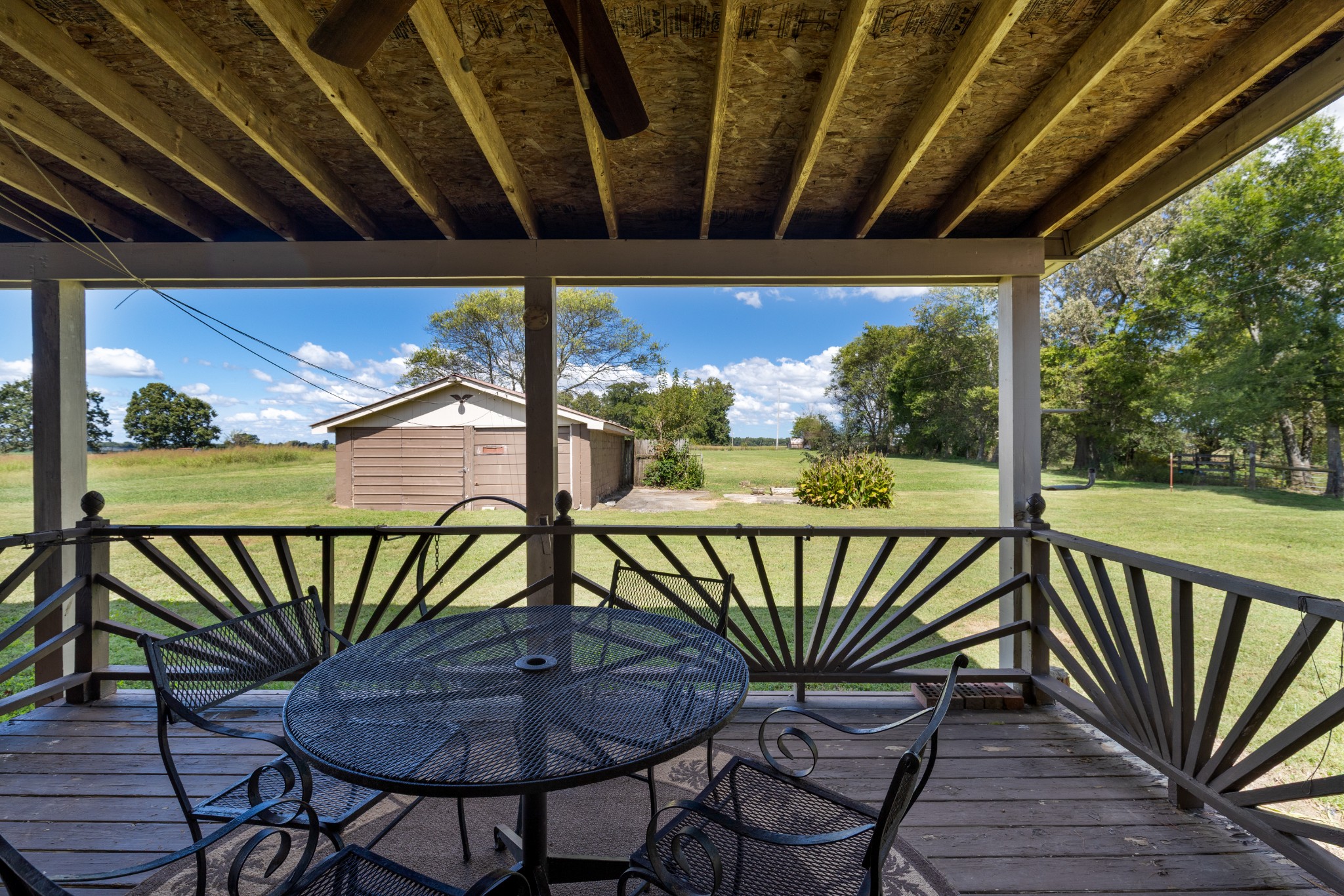 406 Asia Road Winchester, TN 37398 - Photo 8 of 30 a view of a patio with a table chairs and a table